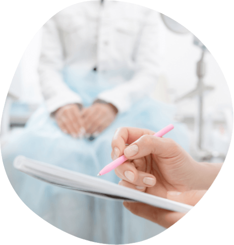 Person using a stylus to type on a tablet