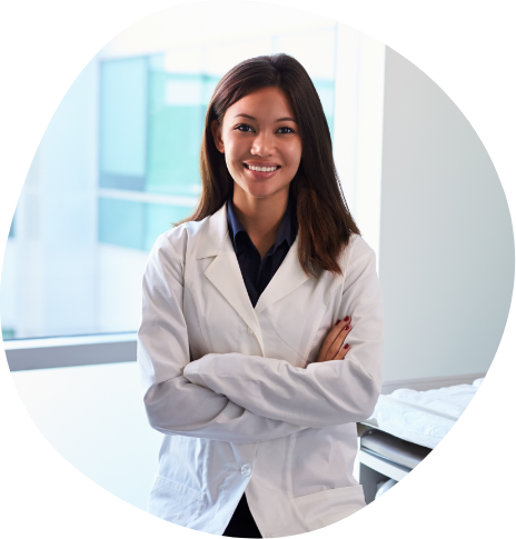 Smiling woman in white lab coat