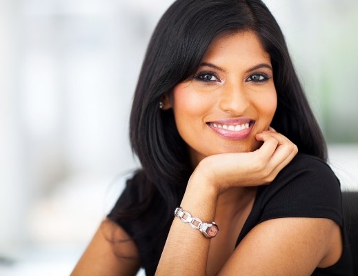 Smiling woman in black blouse