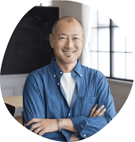 Smiling man in denim shirt