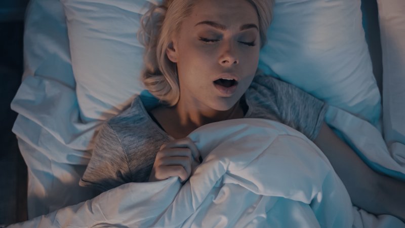 woman snoring while asleep