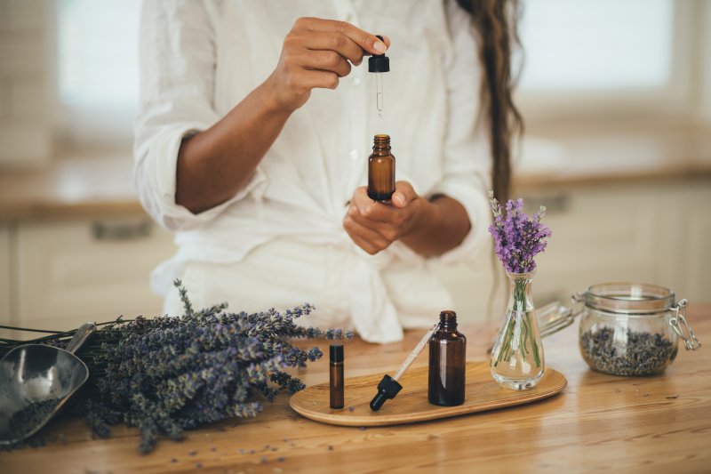 person using essential oils
